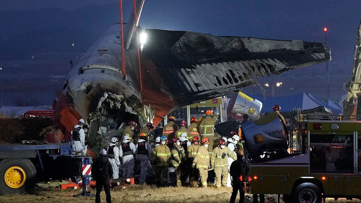 South Korea plane crash passenger body carried