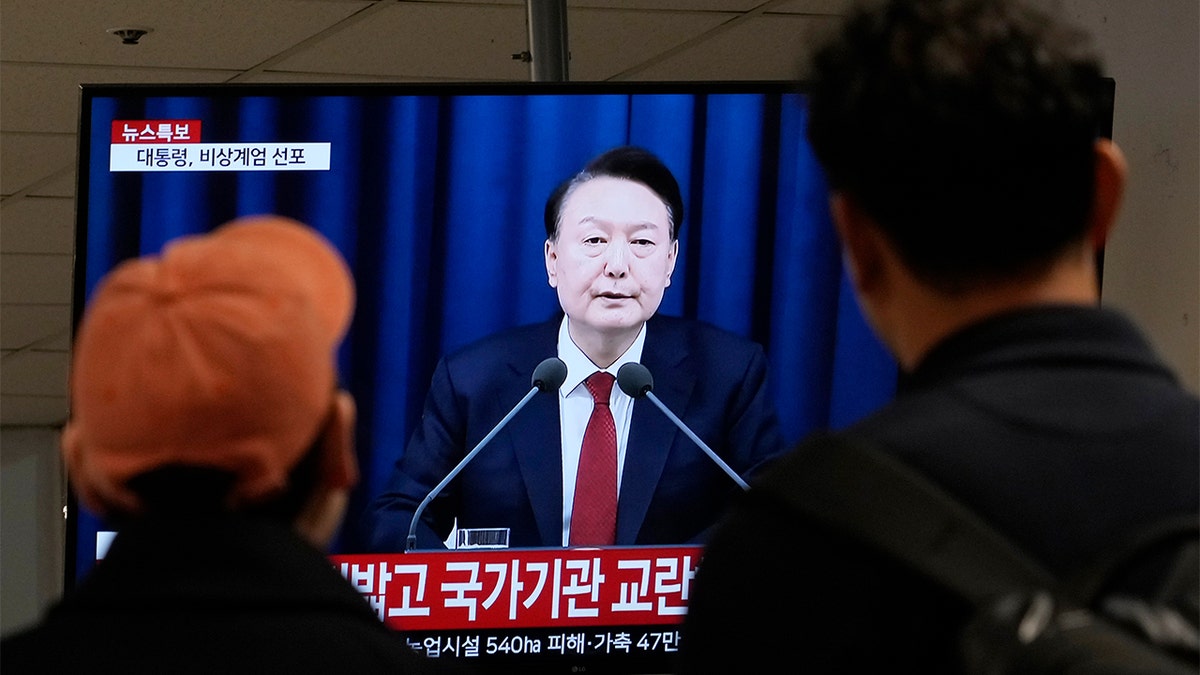 South Koreans watch President Yoon Suk Yeol on TV