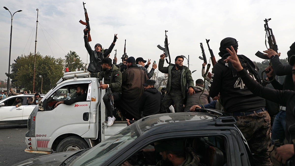 People celebrate in Damascus after the Assad regime in autumn