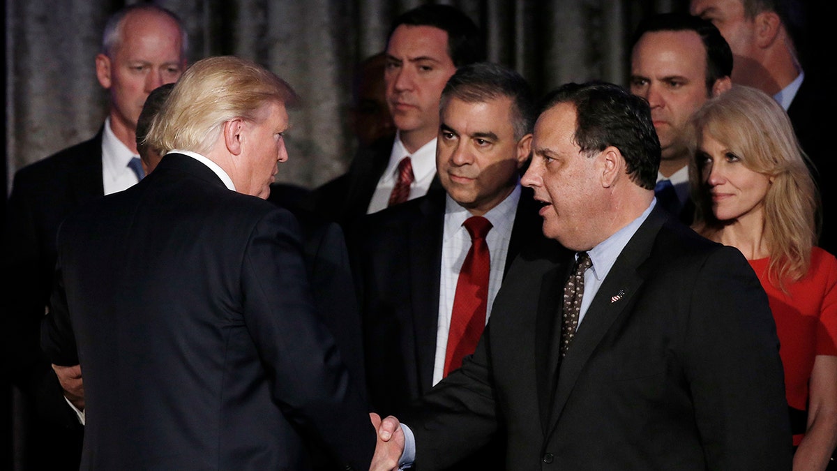 Trump shakes hands with Chris Christie