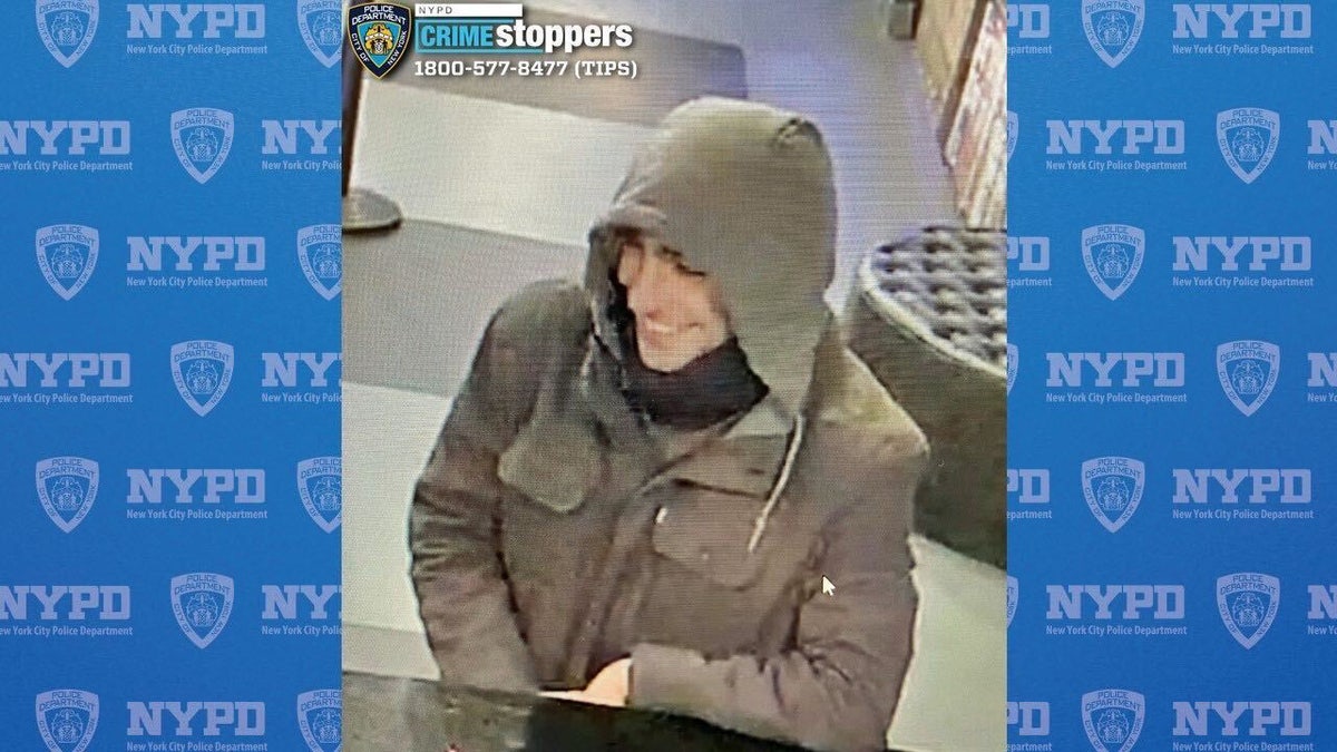 A screenshot taken from surveillance footage released by the NYPD shows a suspected person of interest wanted in connection with the shooting of UnitedHealthcare executive Brian Thompson.