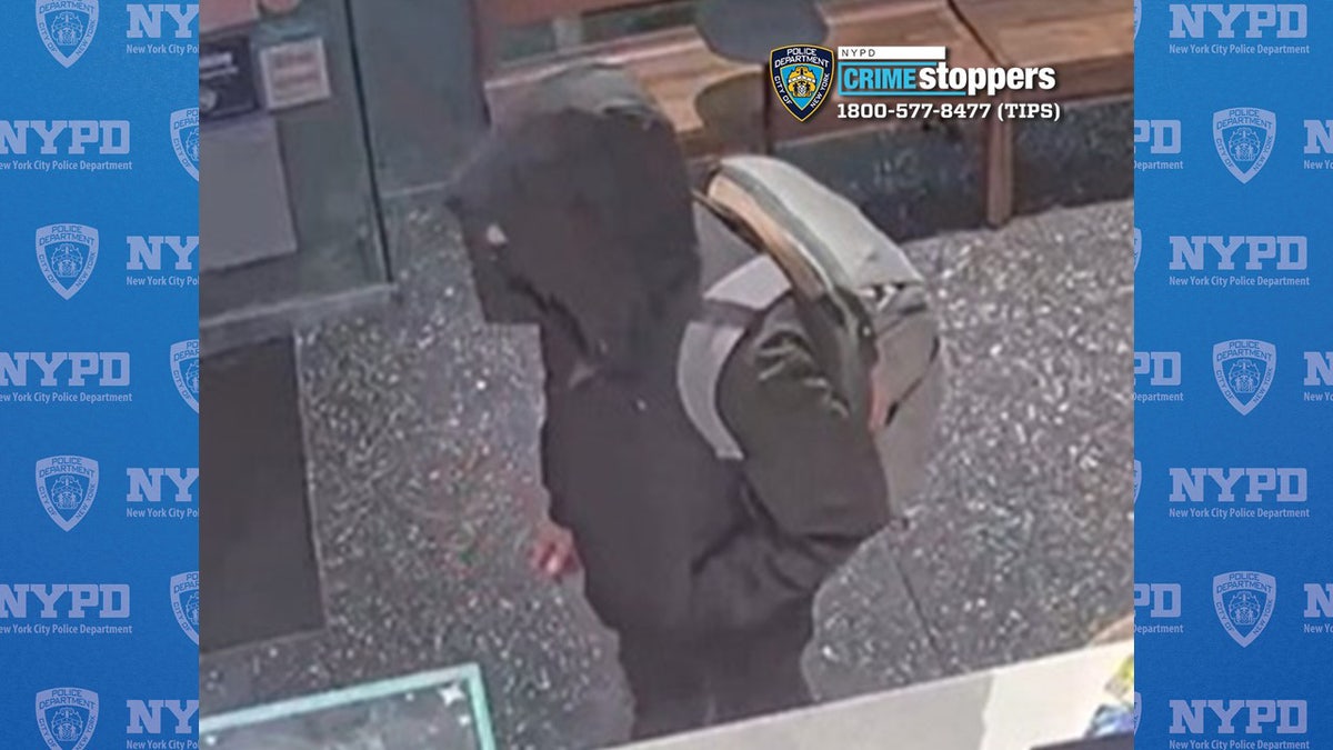 A screenshot from surveillance footage released by the NYPD shows the alleged suspect wanted for the shooting death of UnitedHealth CEO Brian Thompson