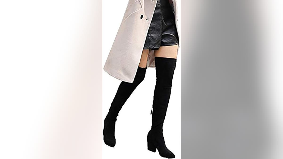 Pair over-the knee boots with all your winter looks.