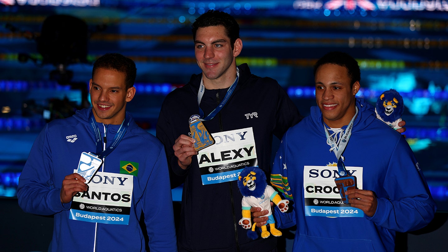 Jack Alexy Captures Individual Gold in 100m Freestyle at World Aquatics Championships