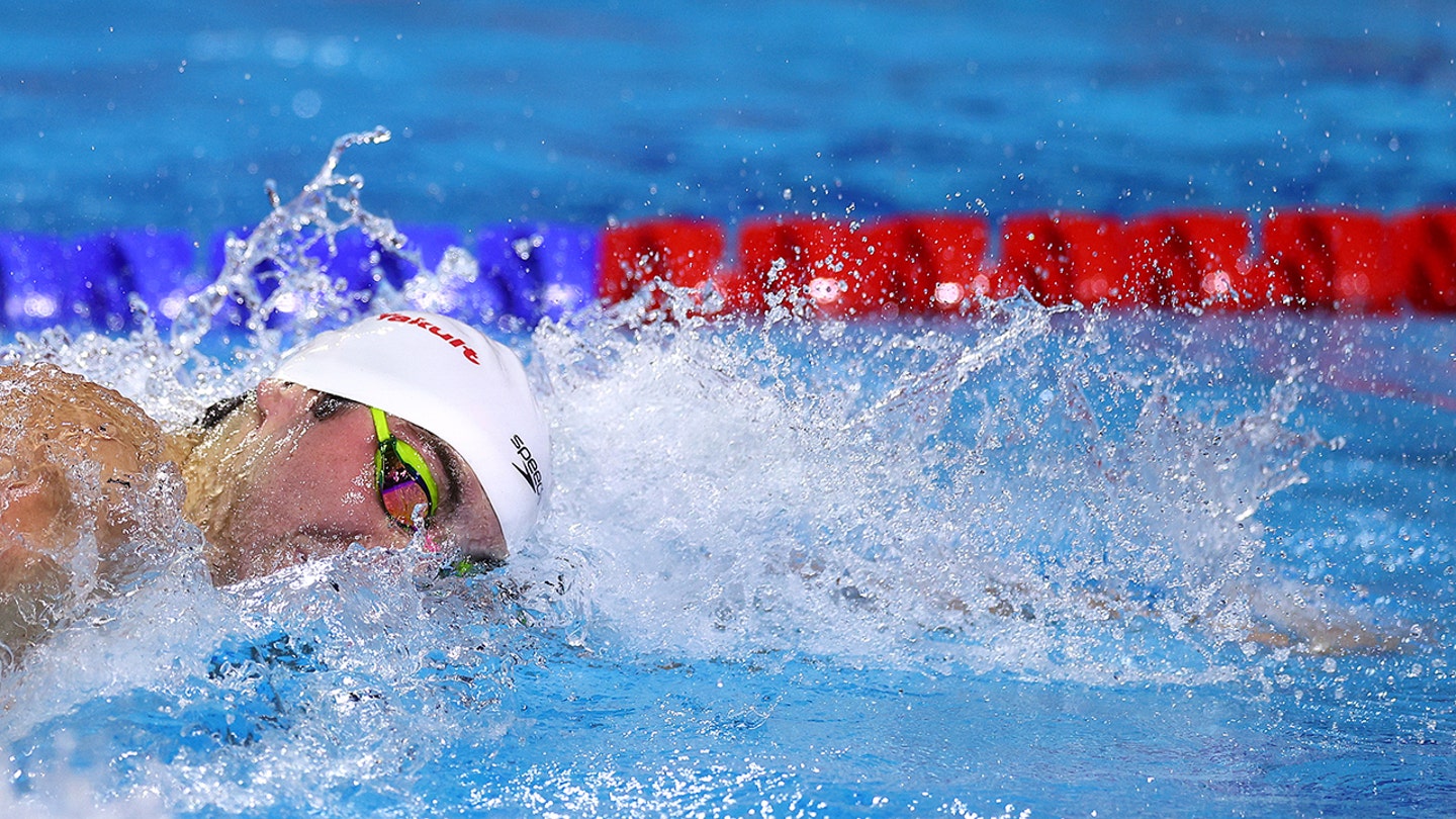 Jack Alexy Captures Individual Gold in 100m Freestyle at World Aquatics Championships