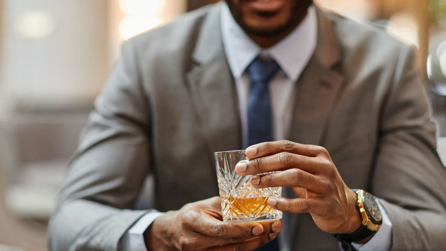 man drinking alcohol