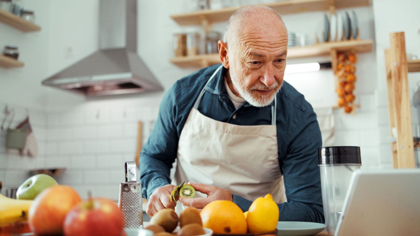 senior man cooking