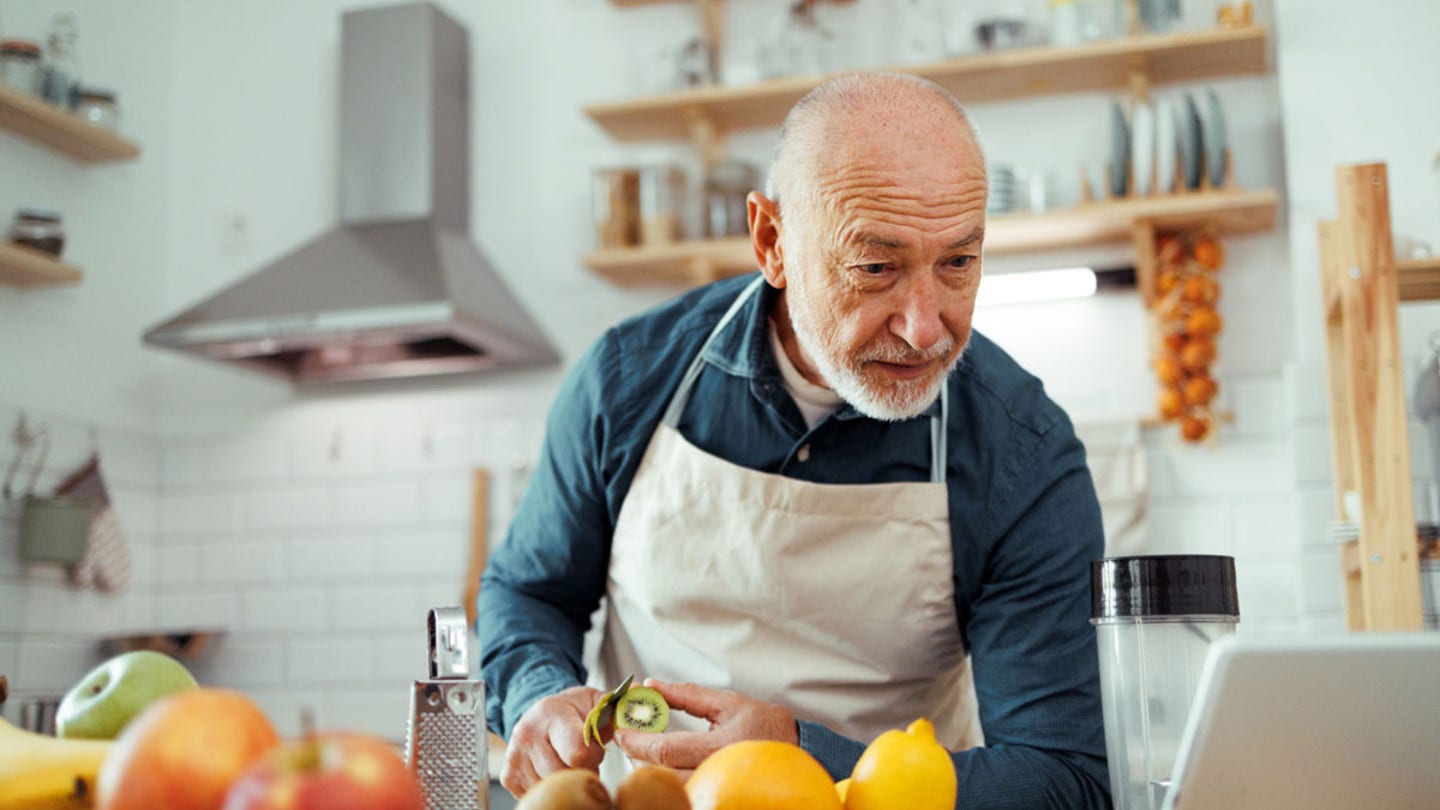senior man cooking