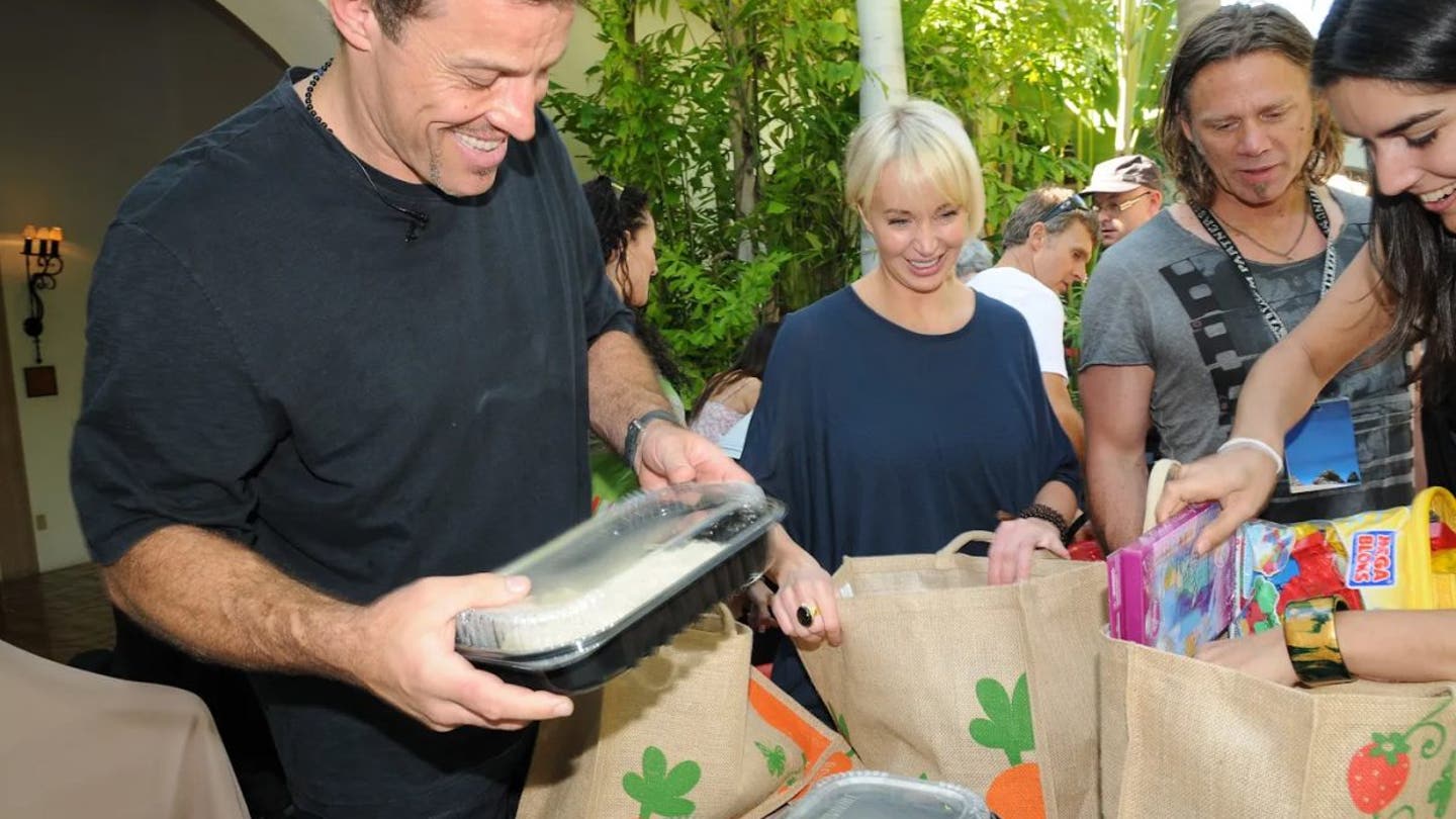 tony sage robbins handing out food e1733247014987