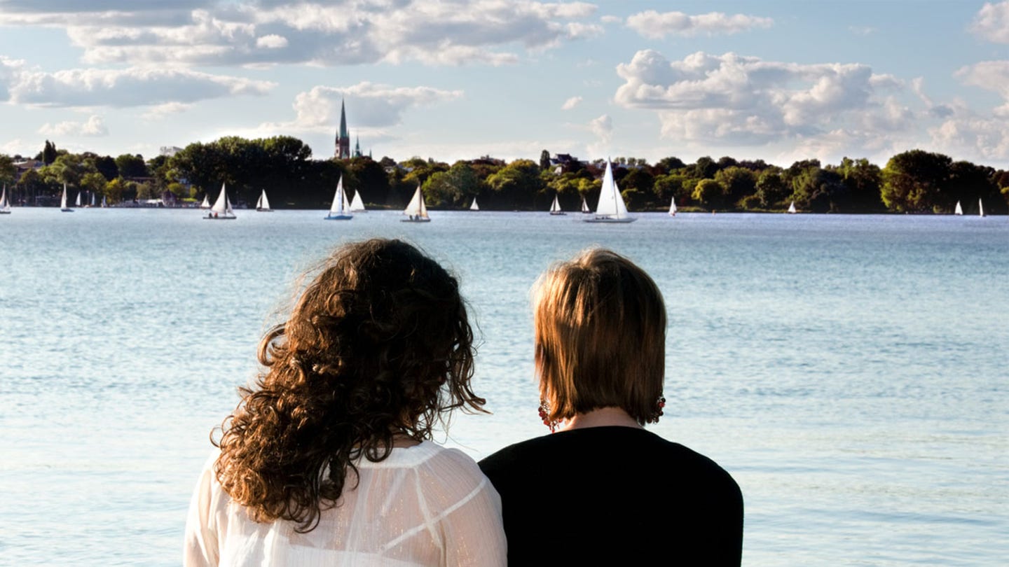 two women watching sky