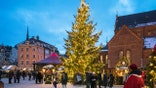 Riga, Latvia – January 6, 2019: People visiting Christmas market in the Dome square in the center of Riga.