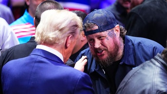Jelly Roll defends his reaction when he met newly elected Trump at UFC match - Fox News