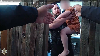 Colorado deputies' daring rescue of two children from house fire captured on bodycam video
