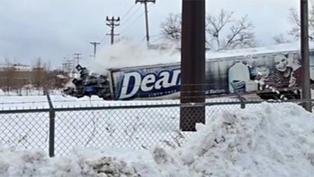 Pennsylvania train slams into milk truck, video shows