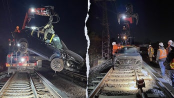 SUV driver's joyride on New York railroad tracks ends in fiery wreck: police