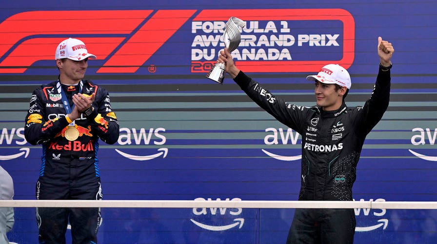 F1 drivers zoom down the straightaway at the Las Vegas Grand Prix