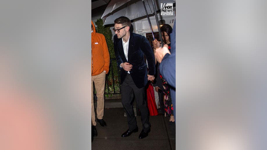 Guests leave the engagement party of Huma Abedin and Alex Soros