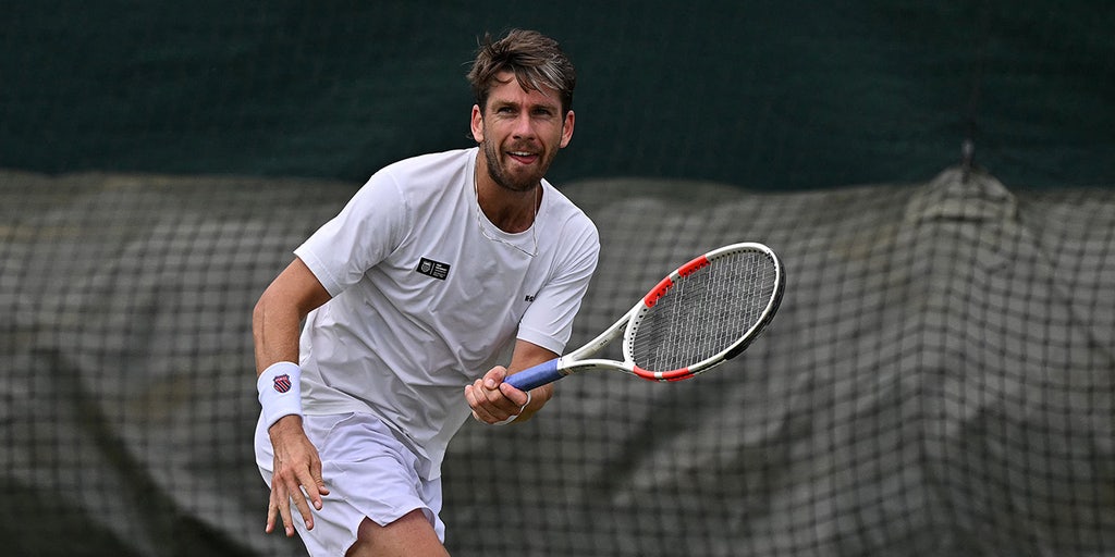 Tennis player hits woman in front row with errant racket throw