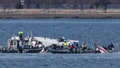 Emergency workers recover debris from the Potomac River in the aftermath of the collision of American Eagle flight 5342 and a Black Hawk helicopter, as seen from Virginia, Jan. 30, 2025. - Fox News