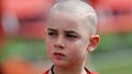 FILE - Cancer survivor Jack Hoffman before delivering a drug-free pledge during the halftime of Nebraska's NCAA college football spring game in Lincoln, Neb., April 12, 2014. - Fox News
