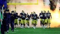 The Notre Dame Fighting Irish run onto the field prior to the Playoff First Round game against the Indiana Hoosiers at Notre Dame Stadium on December 20, 2024 in South Bend, Indiana. - Fox News