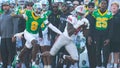 Ohio State Buckeyes wide receiver Jeremiah Smith (4) catches a pass in front of Oregon Ducks quarterback Dillon Gabriel (8) during the first half of the College Football Playoff quarterfinal at the Rose Bowl in Pasadena, Calif. on Jan. 1, 2025. - Fox News