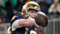 Notre Dame quarterback Riley Leonard celebrates after a touchdown against Ohio State during first half of the College Football Playoff national championship game Monday, Jan. 20, 2025, in Atlanta. - Fox News