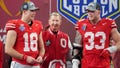 Ohio State quarterback Will Howard (18) and defensive end Jack Sawyer (33) celebrate with the university's president Ted Carter, middle, after the Cotton Bowl College Football Playoff semifinal game against Texas, Friday, Jan. 10, 2025, in Arlington, Texas. - Fox News