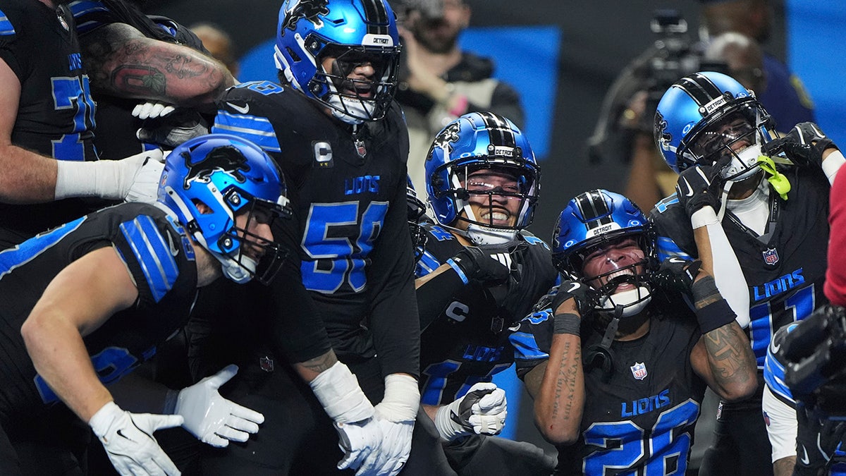 Lions players celebrate