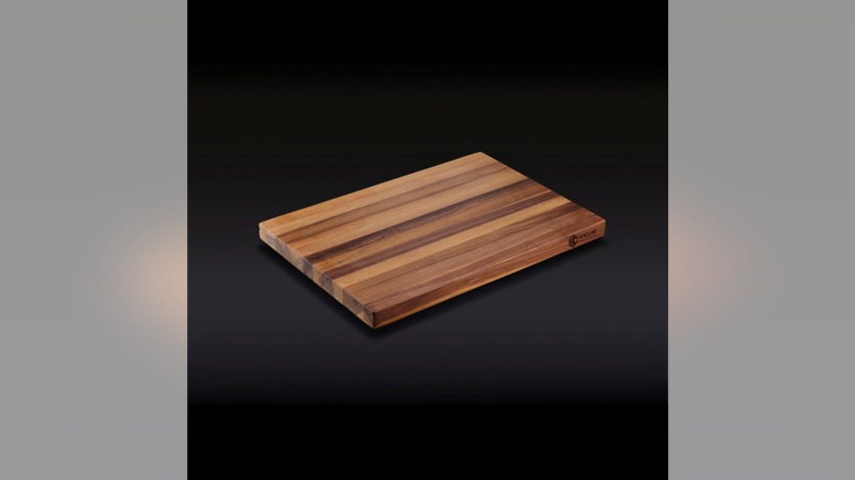 This cutting board is made from durable walnut.?