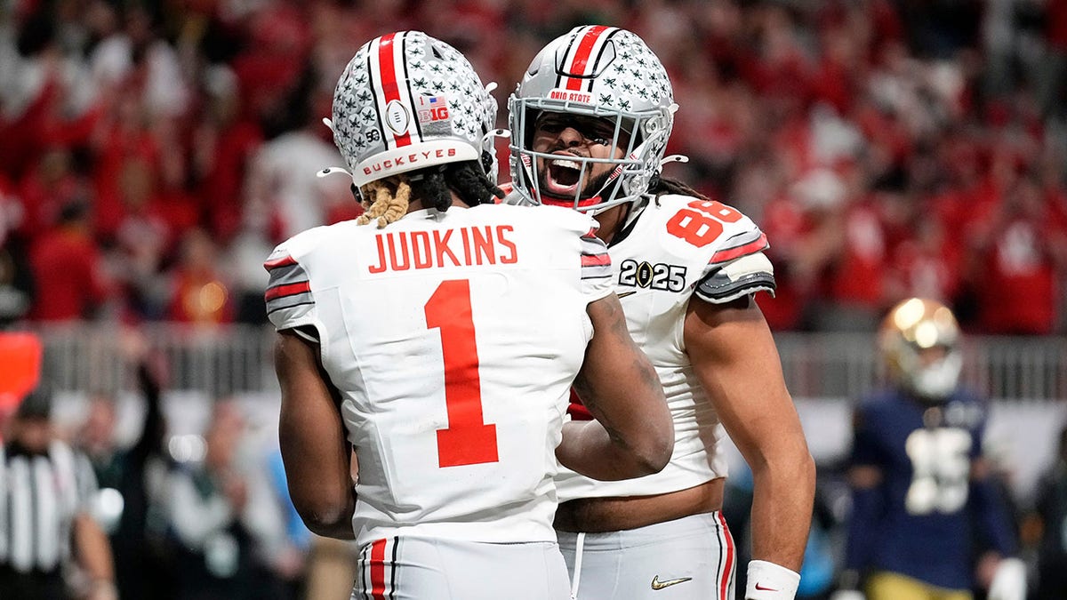 Quinshon Judkins celebrates touchdown with Gee Scott Jr.