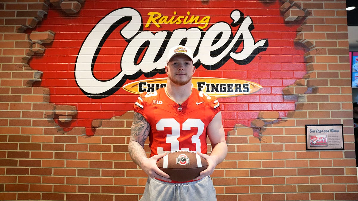 Jack Sawyer poses inside Raising Cane's