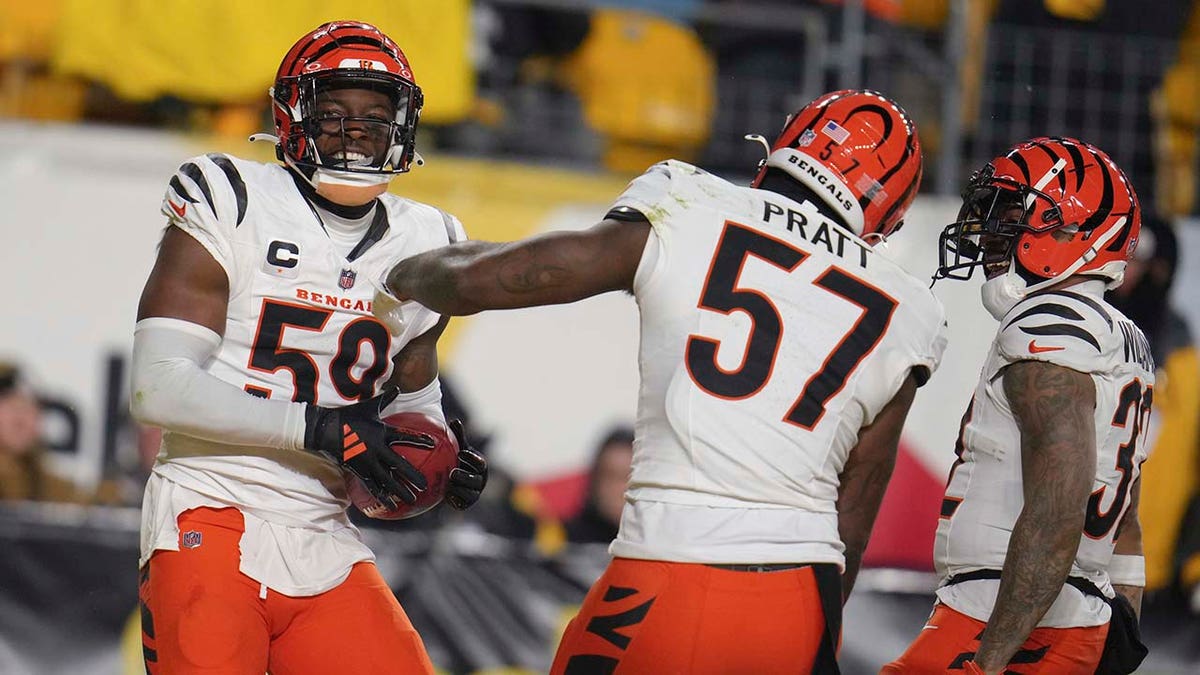 Bengal defensive players celebrate