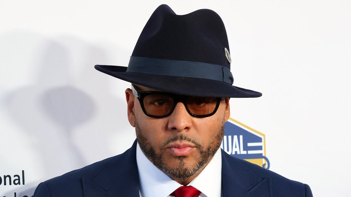 Al B for sure! Wearing a hat and glasses at a Hollywood event.