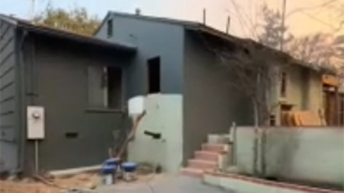 A home survives the Eaton Fire in Los Angeles County