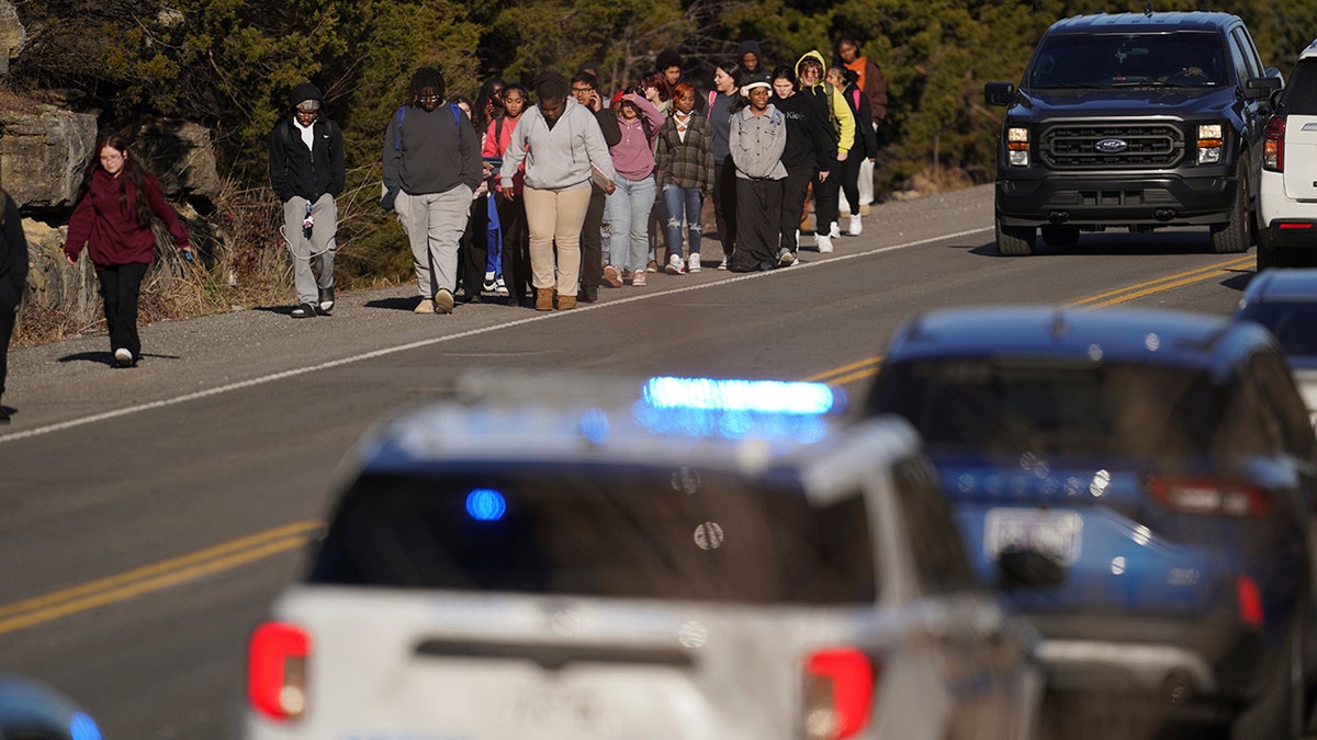 Students walk away from Antioch High School