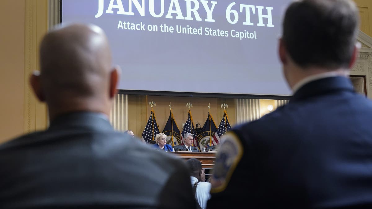 U.S. Capitol Police Sergeant Aquilino Gonell, left, and Washington Metropolitan Police Department Officer Daniel Hodges listen as the House Select Committee investigating the Jan. 6 attack on The US Capitol holds a hearing on Capitol Hill in Washington on October 13, 2022.