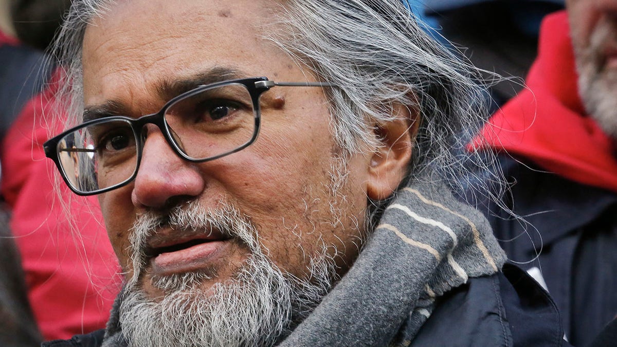 Immigration activist Ravi Ragbir listens during a news conference at New York City Hall called by city council members on his behalf, Jan. 31, 2018. 