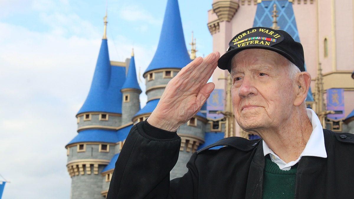 Bill Connelly in front of the Magic Kingdom castle