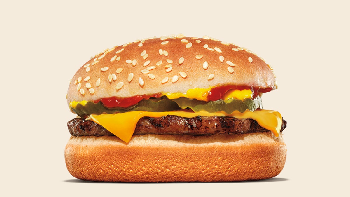 A Burger King cheeseburger is displayed.