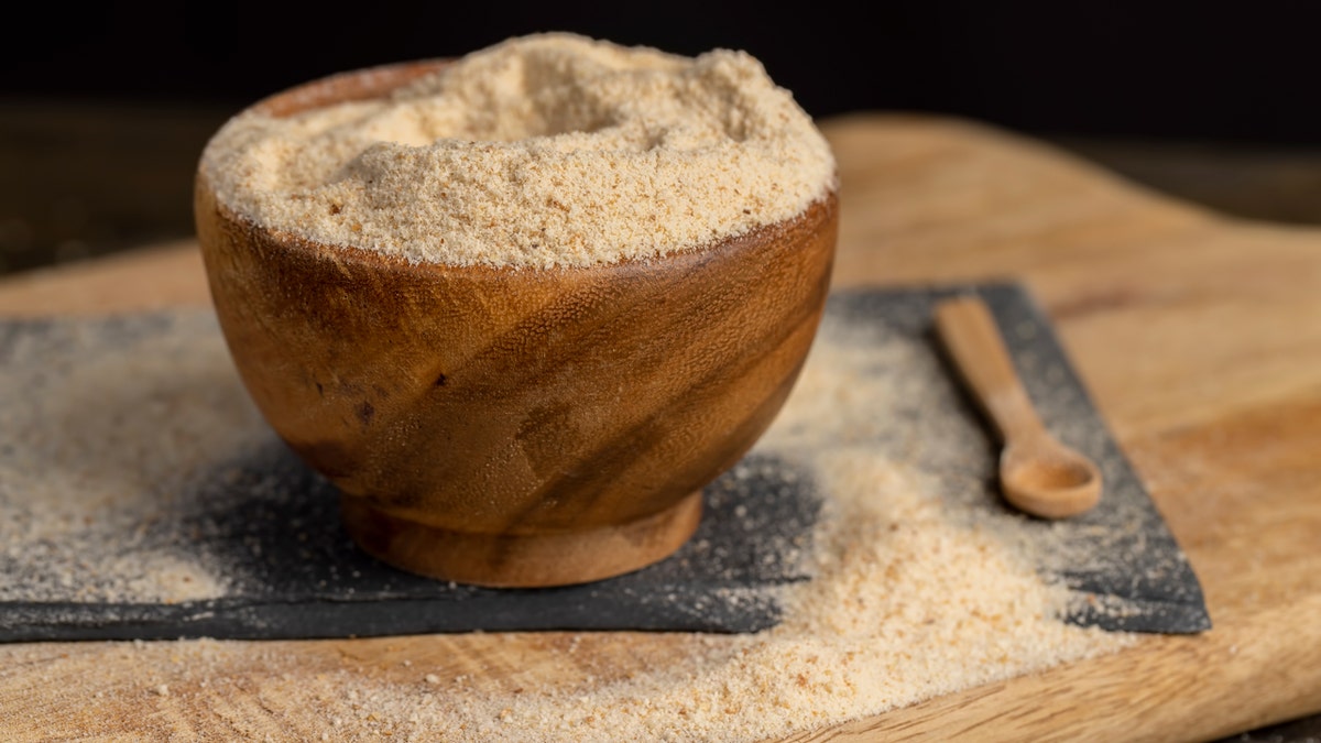 Breadcrumbs in a wooden bowl.