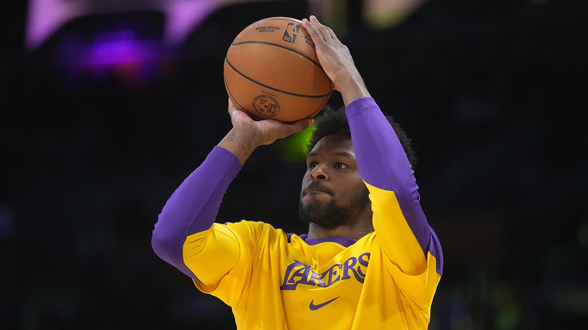 Bronny James warms up