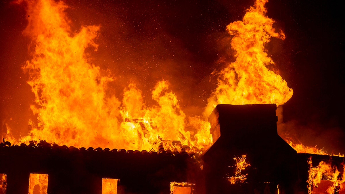 Fire breaks out in Palisade during storm on Los Angeles' west side