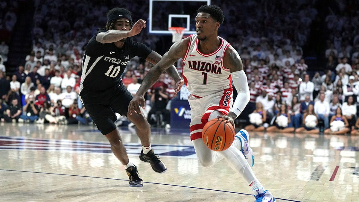 Caleb Love drives to the hoop