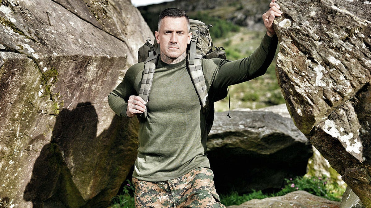 Carey Hart in military fatigues for 