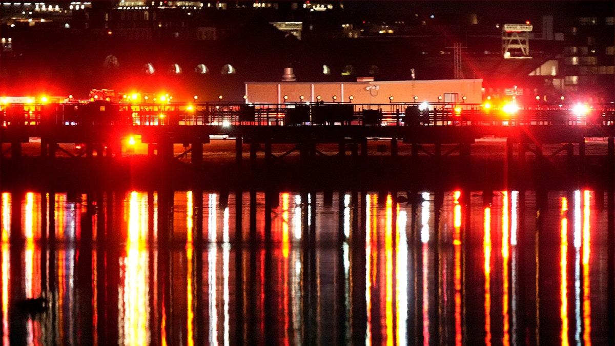 Rescuers work on the Potomac River in Washington DC after a tragic plane crash