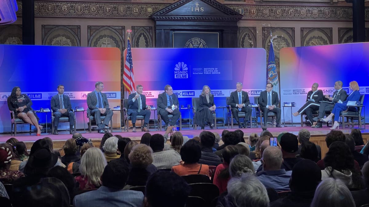 The eight candidates vying for Democratic National Committee chair sit for a forum that was repeatedly interrupted by protesters, at Georgetown University in Washington D.C., on Jan. 30, 2025.