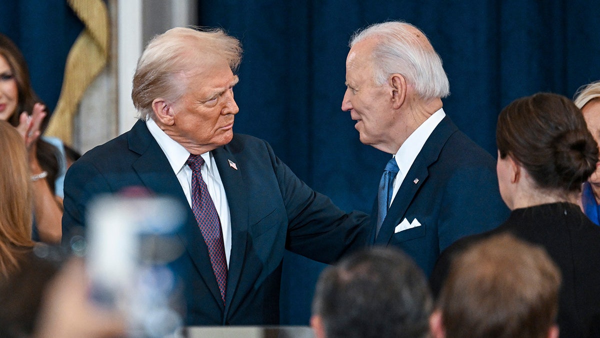 President-elect Donald Trump, left, greets President Joe Biden at the 60th Presidential Inauguration in the Rotunda of the U.S. Capitol