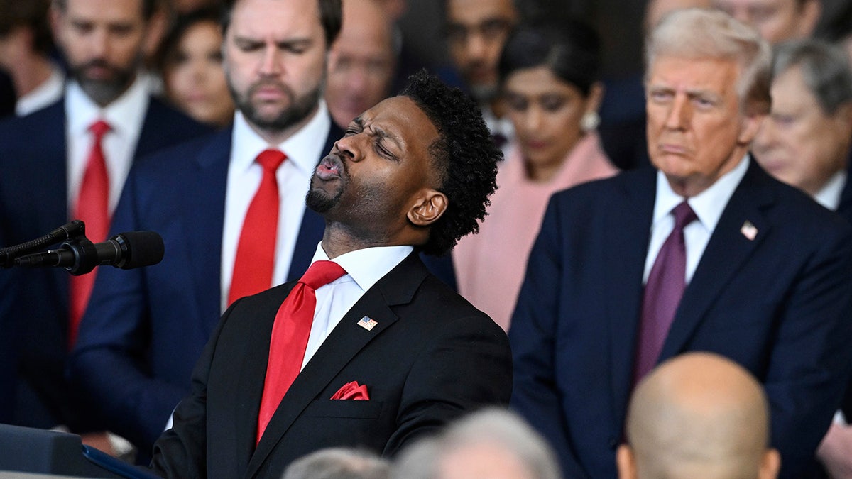 Pastor of 180 Church Lorenzo Sewell, delivers a benediction aft  President Donald Trump was sworn in