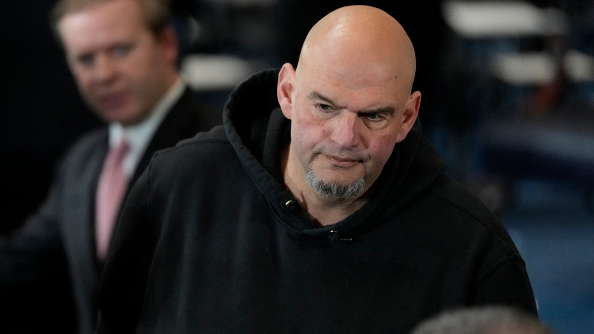 Sen. John Fetterman, D-Pa., arrives before the 60th Presidential Inauguration in the Rotunda of the U.S. Capitol in Washington